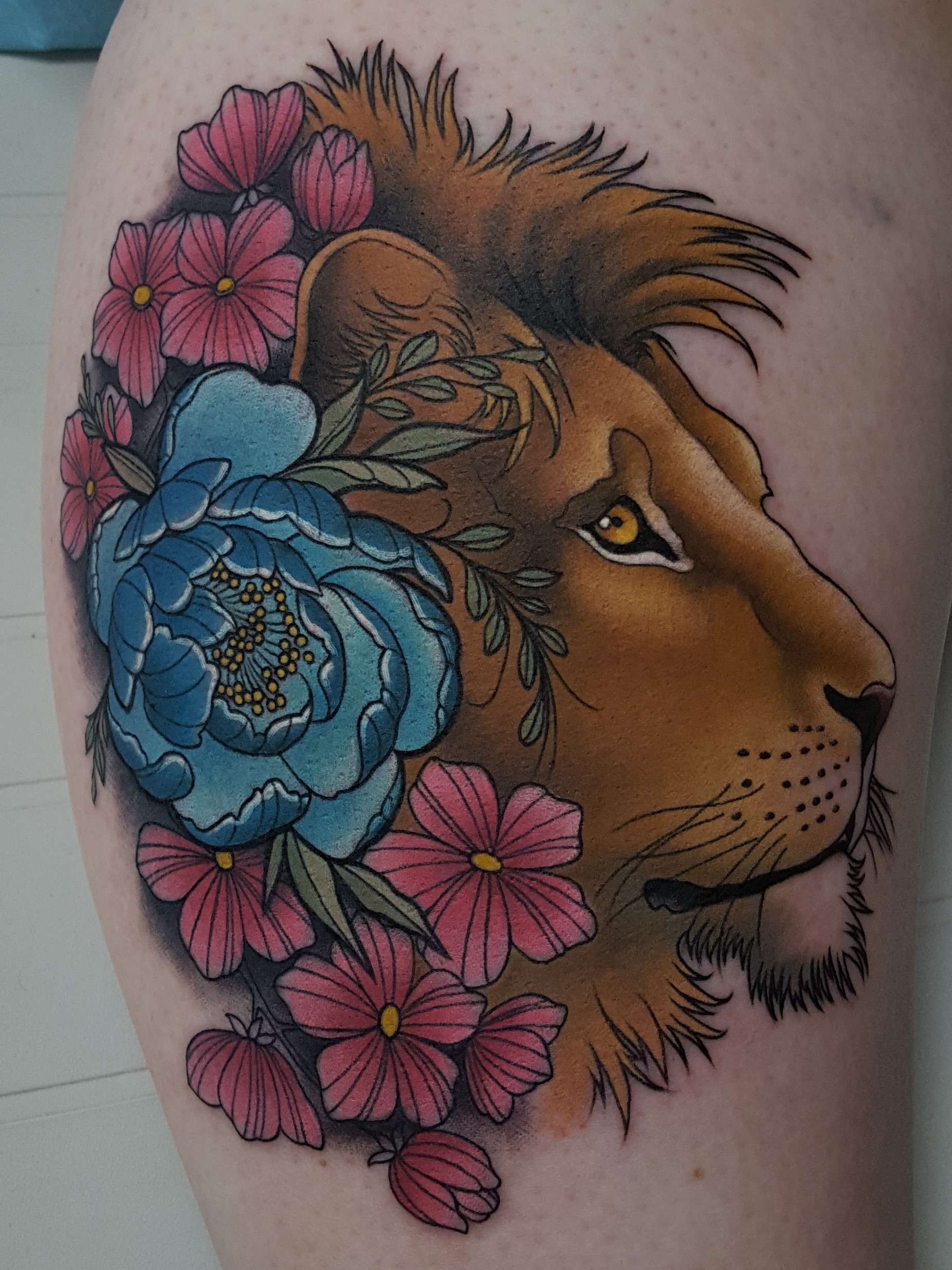 Lion head tattoo by Cracker Joe Swider in Connecticut